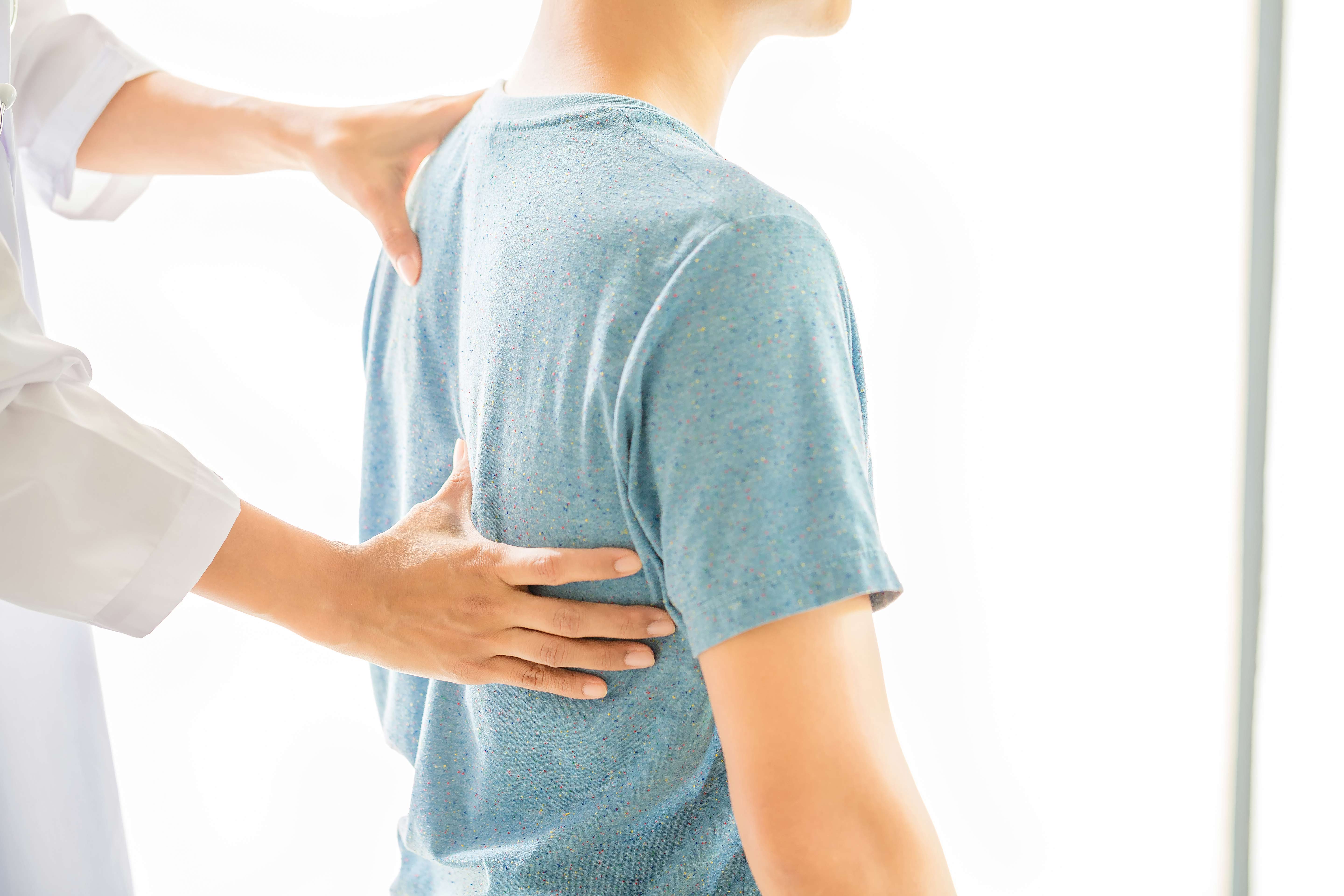 close up physiotherapist working with patient clinic 1